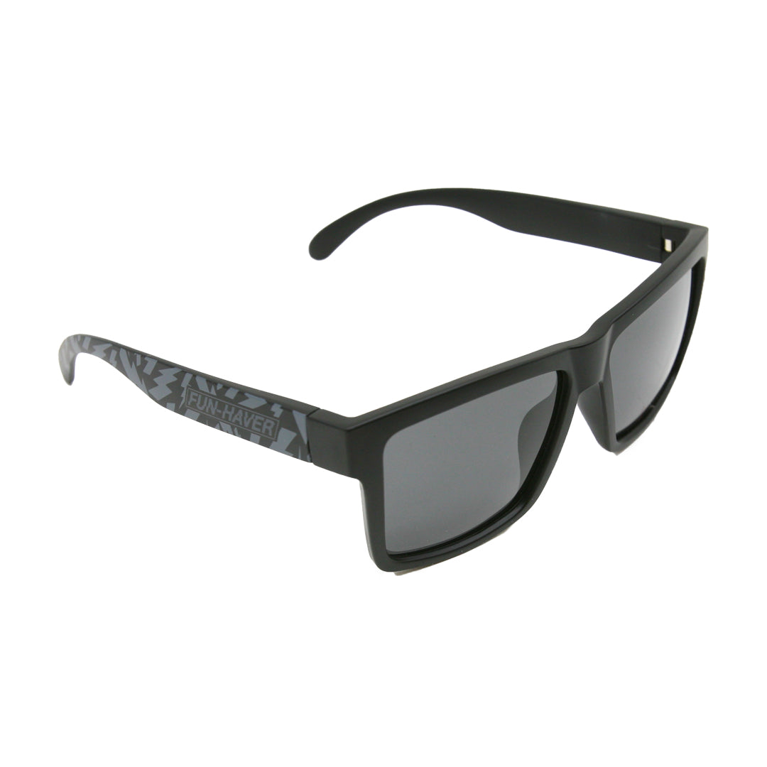 Quarter view of Fun-Haver Dark Storm Striker Sunglasses with matte black design, printed lightning bolts and black lenses