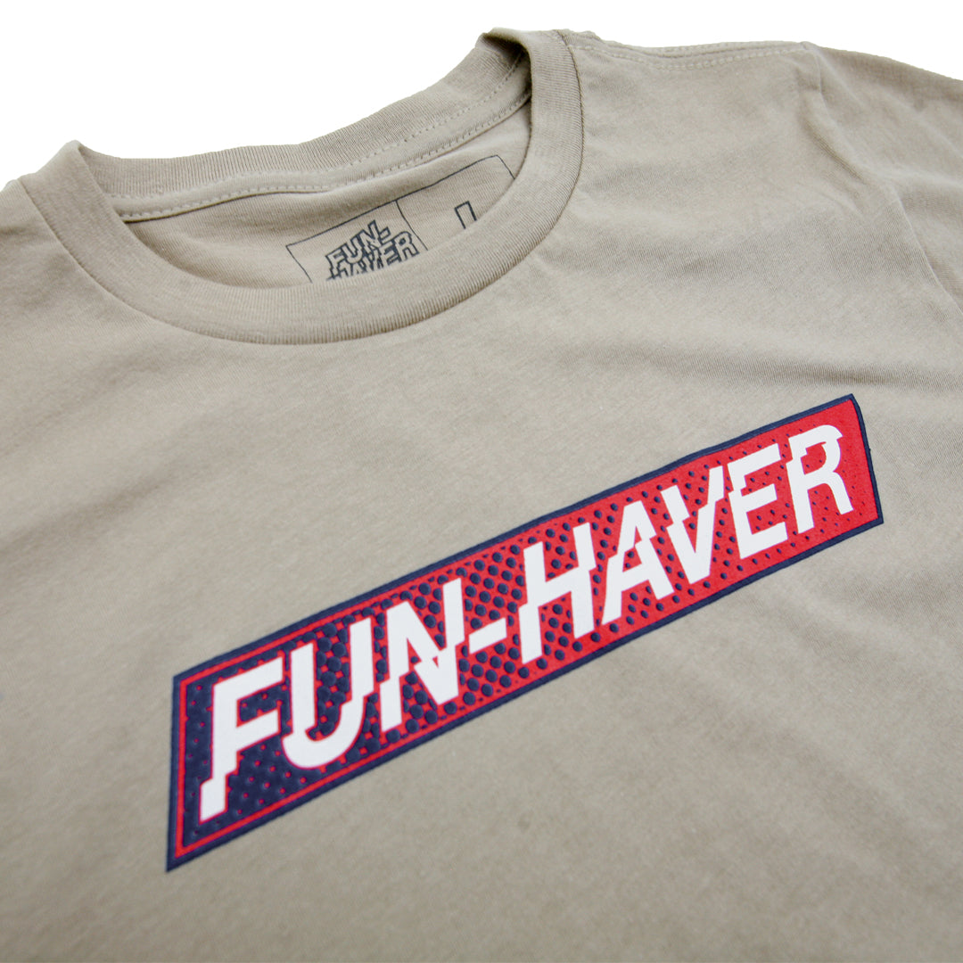 Tan Fun-Haver Foundation youth t-shirt with Fun-Haver logo in red, white, and blue printed across the chest.