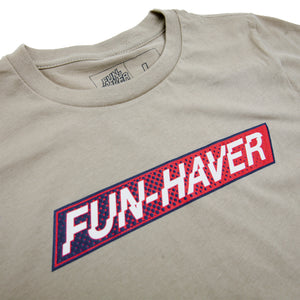 Tan Fun-Haver Foundation youth t-shirt with Fun-Haver logo in red, white, and blue printed across the chest.