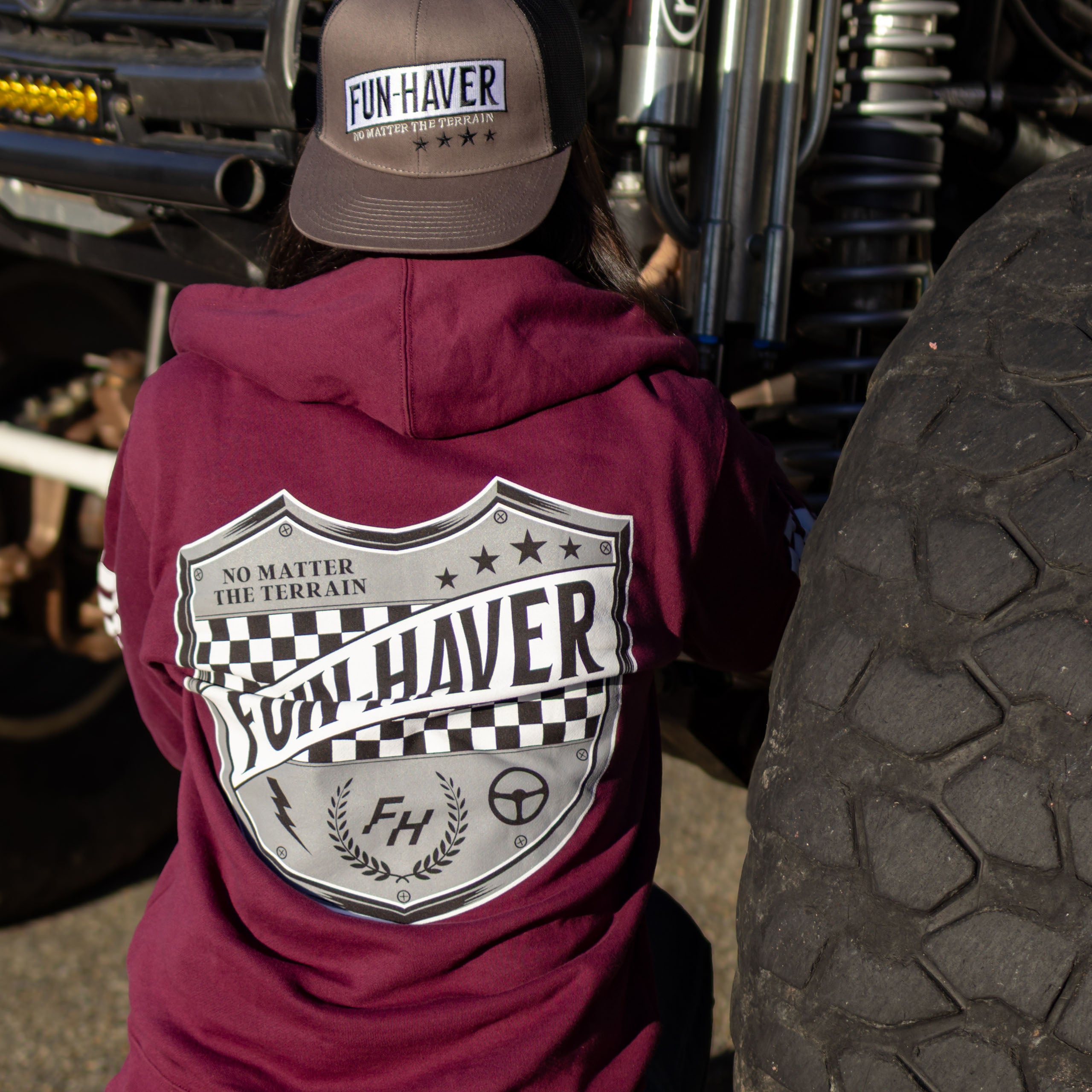 Kelsie Heck wearing the Fun-Haver® Maroon Shield Zip Hoodie