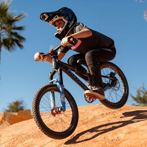 Fun-Haver wearing the Heavy Metal Fun-Haver Youth T-Shirt for some two wheel fun