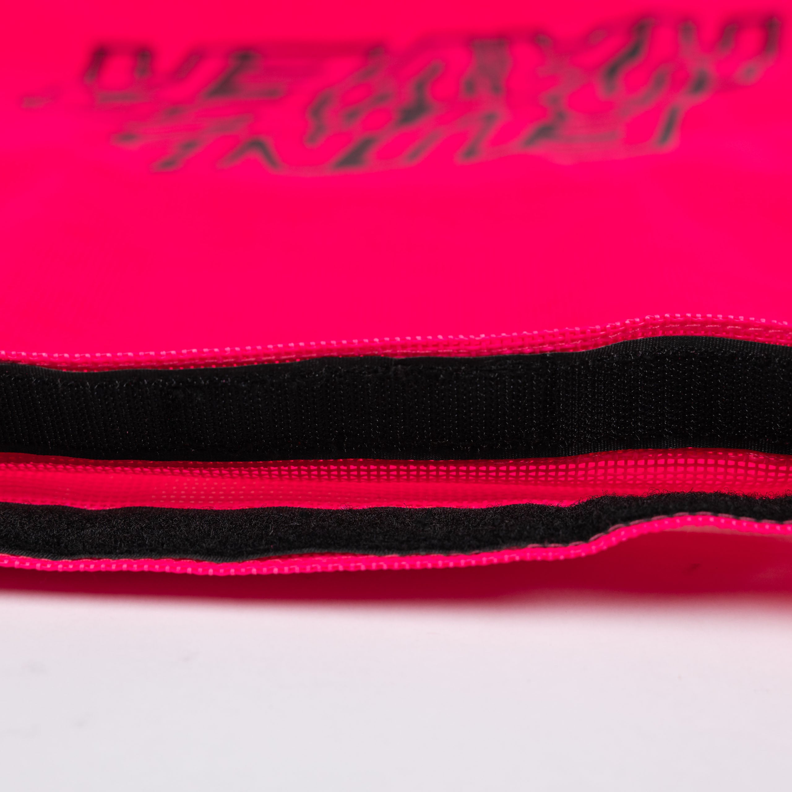 Detail view of the Pink Fun-Haver Trail Bag velcro opening.