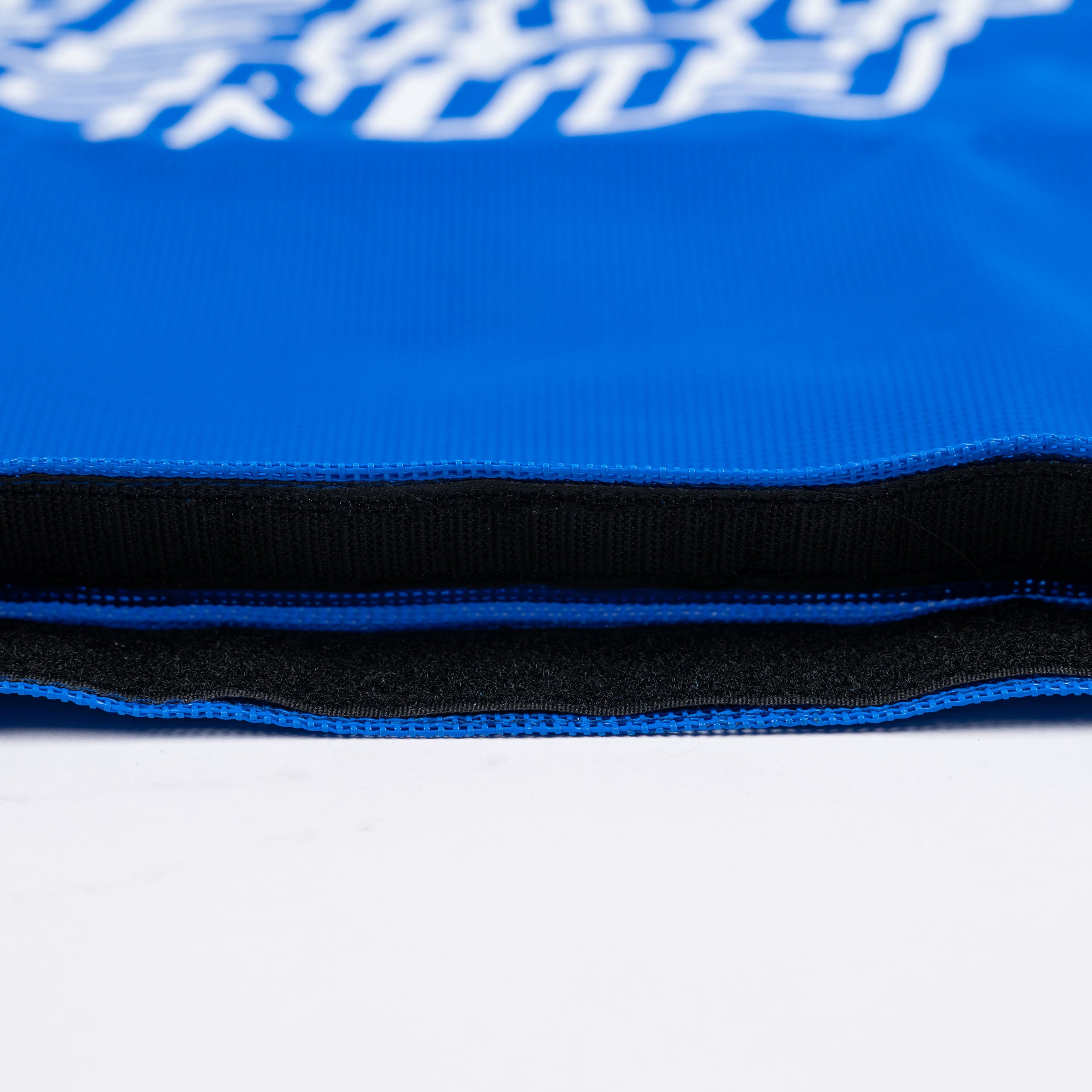 Detail view of the Blue Fun-Haver Trail Bag velcro opening.