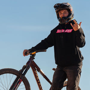 Cam wearing the Black Fun-Haver Energy Pullover Hoodie getting ready for some two wheel mayhem.