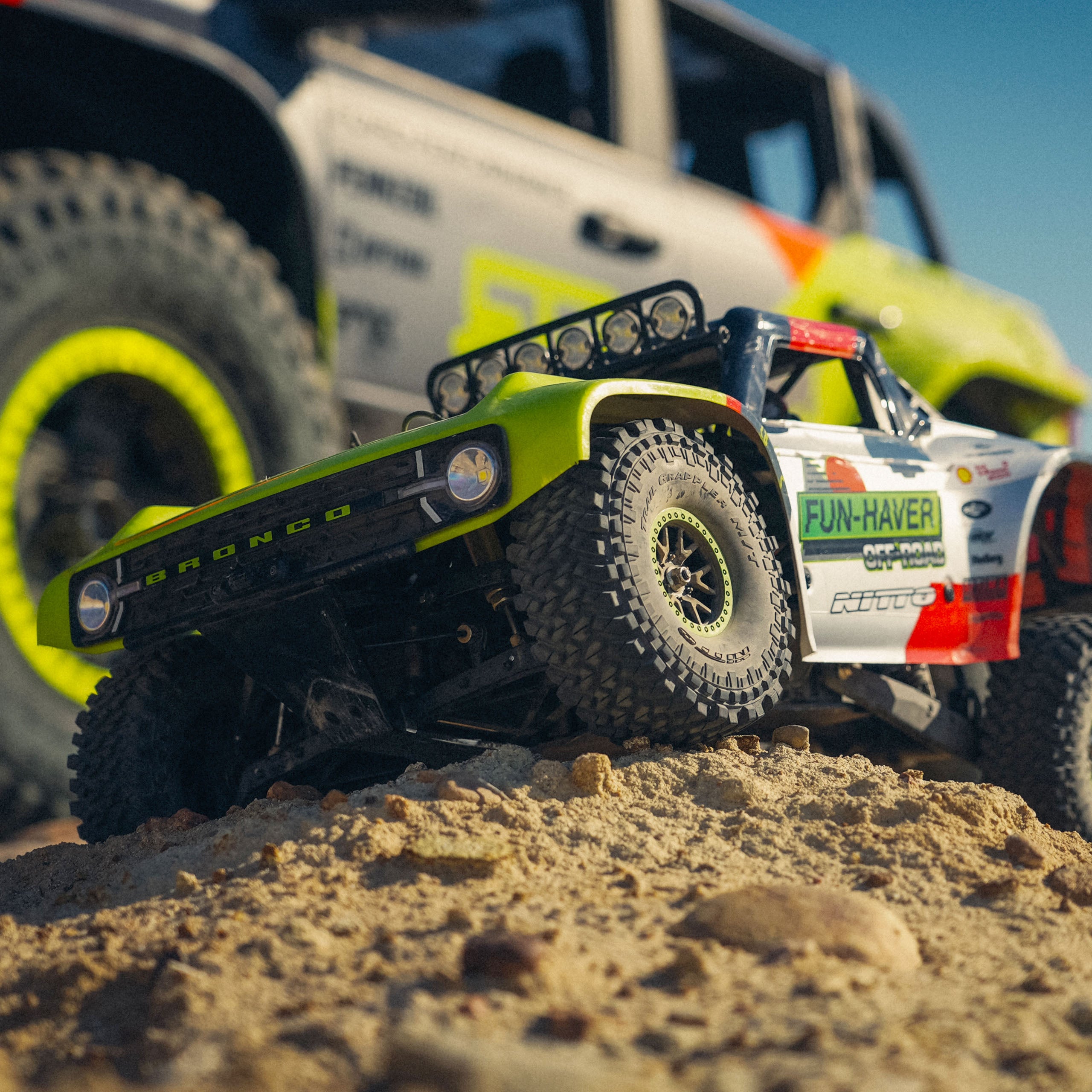 The Fun-Haver FMS Hobby 1:7th scale radio controlled model Ford Bronco truck in front of the full sized Ford Bronco.