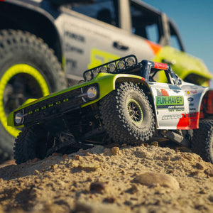 The Fun-Haver FMS Hobby 1:7th scale radio controlled model Ford Bronco truck in front of the full sized Ford Bronco.