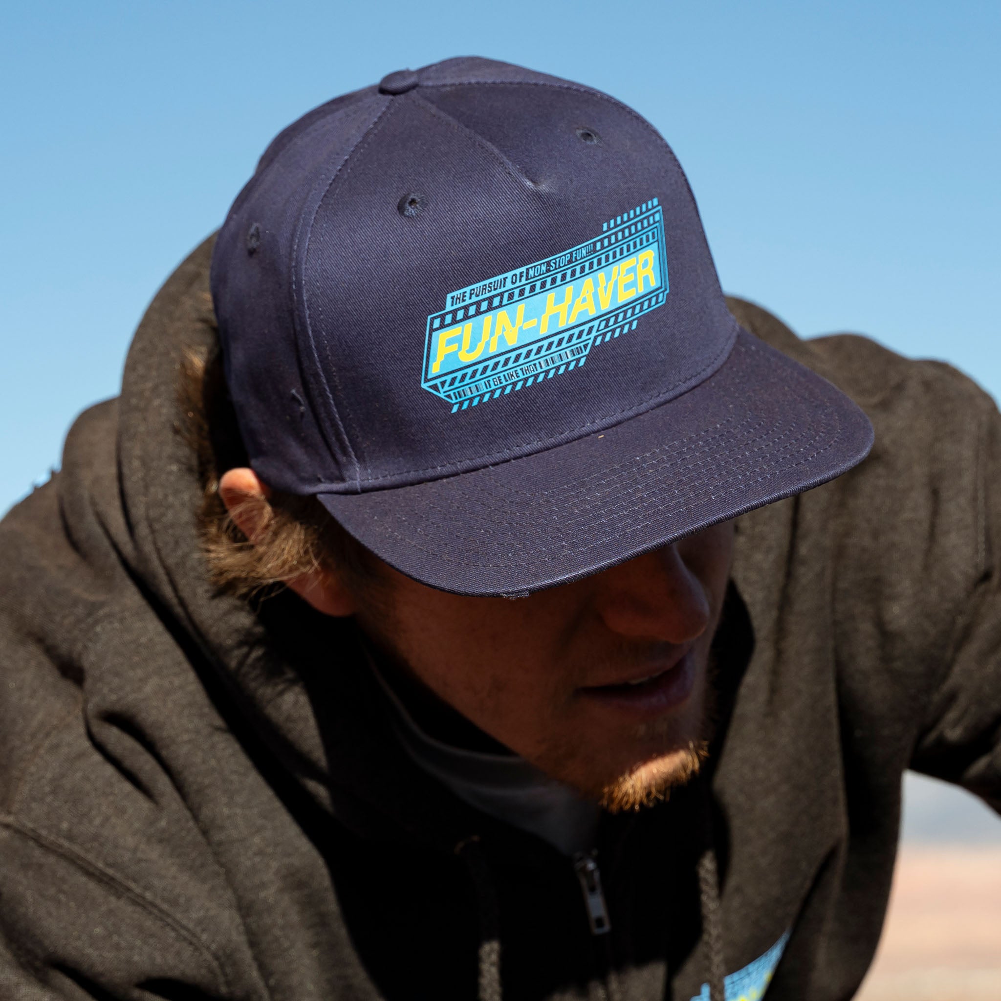 Jake, out on the trail with the Navy Fun-Haver Pursuit Snapback Hat.