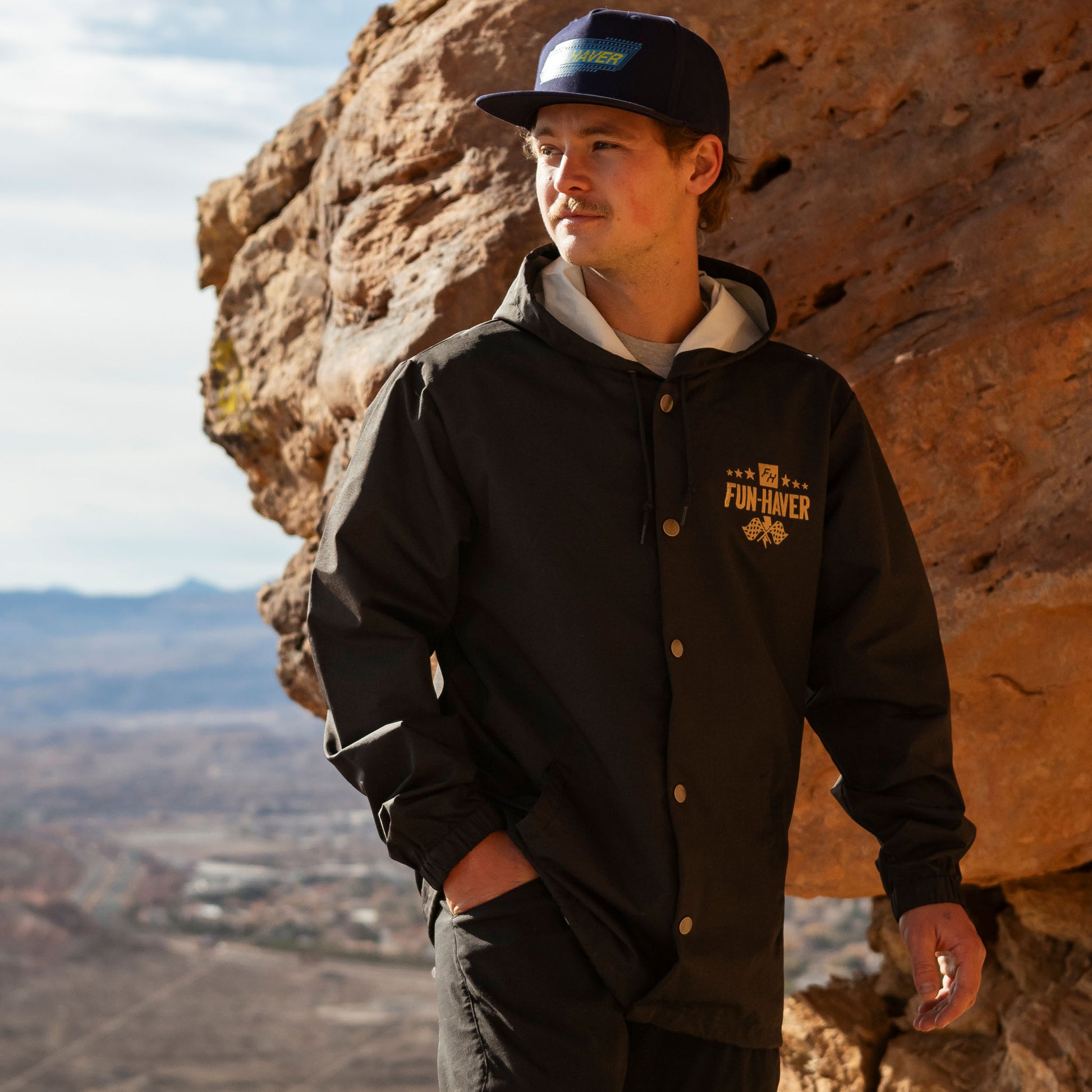 Joel wearing the Black Full Time Fun-Haver® Winbreaker Coaches Jacket.