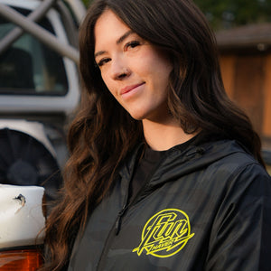 Kelsie Heck wearing the Fun-Haver® Weekend Windbreaker Anorak Jacket in Black Camo.
