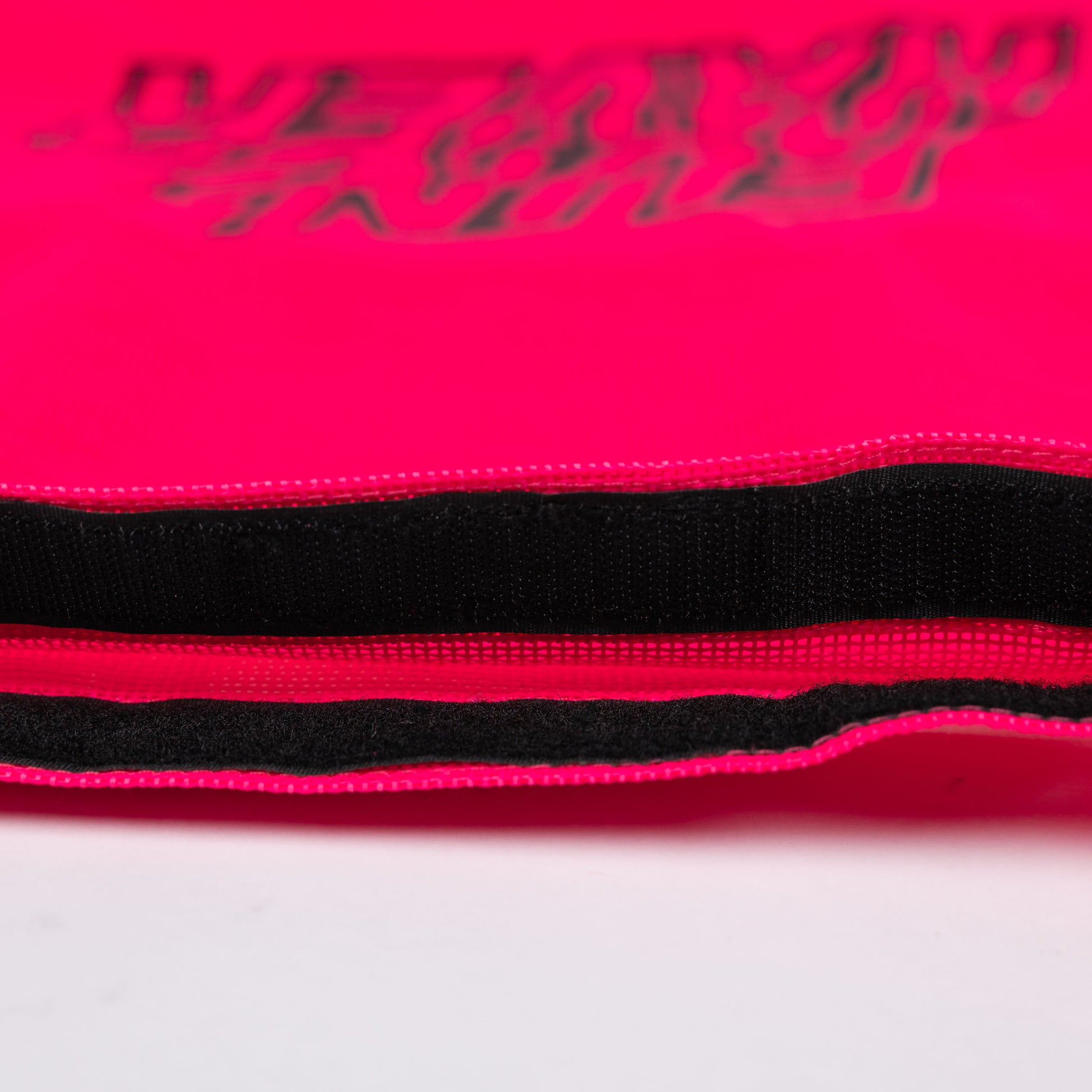 Detail view of the Pink Fun-Haver Trail Bag velcro opening.