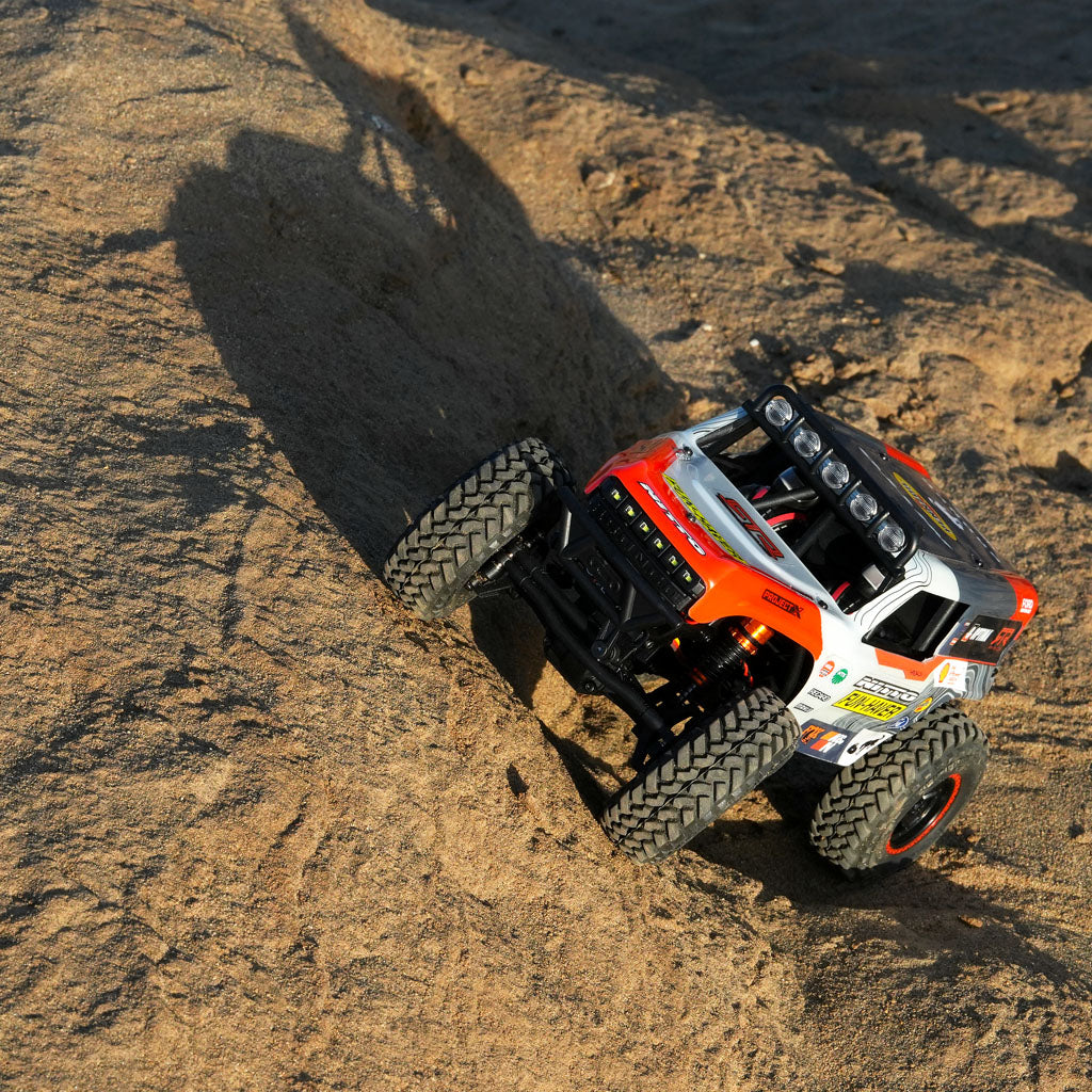 The Fun-Haver Loren Healy Hpi Venture 18 1/10th RC Ultra4 Bronco in action in the early evening sun.
