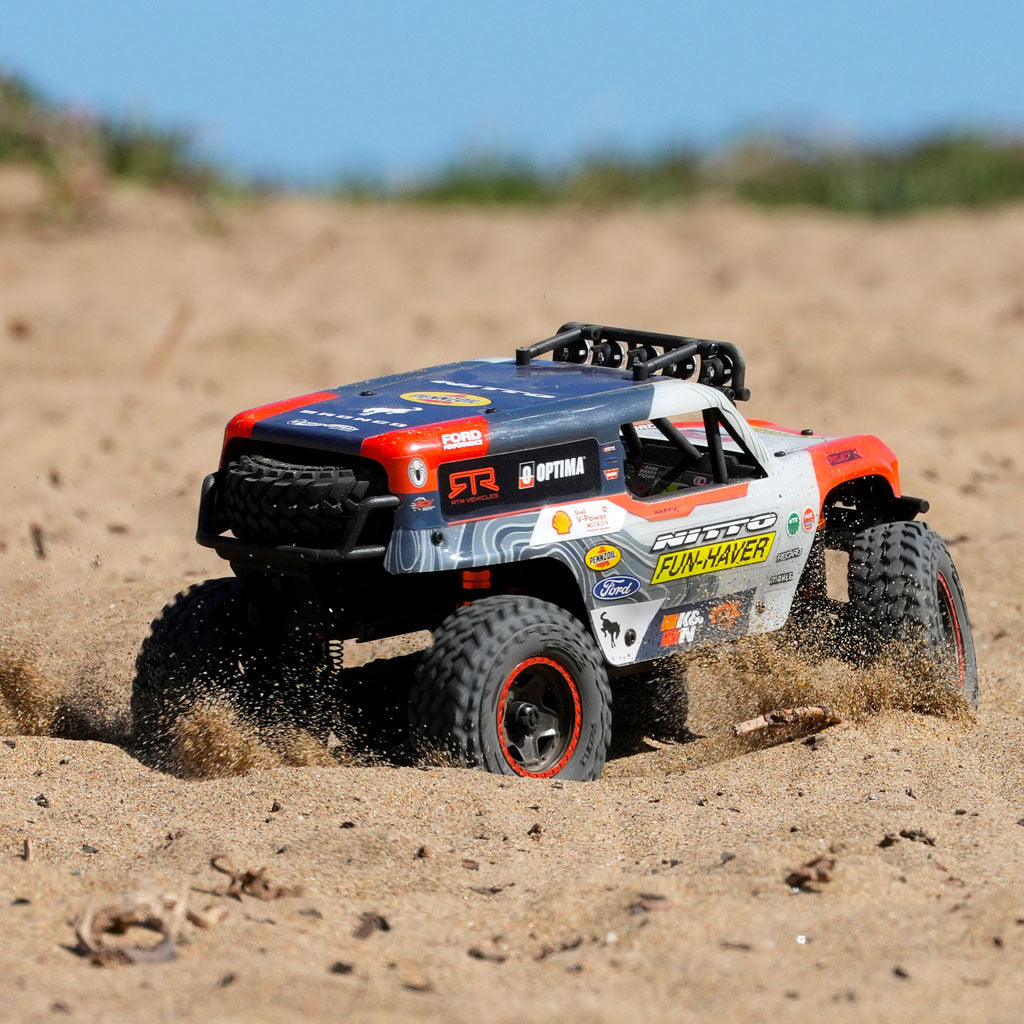 The Fun-Haver Loren Healy Hpi Venture 18 1/10th RC Ultra4 Bronco in action shredding in the sand.
