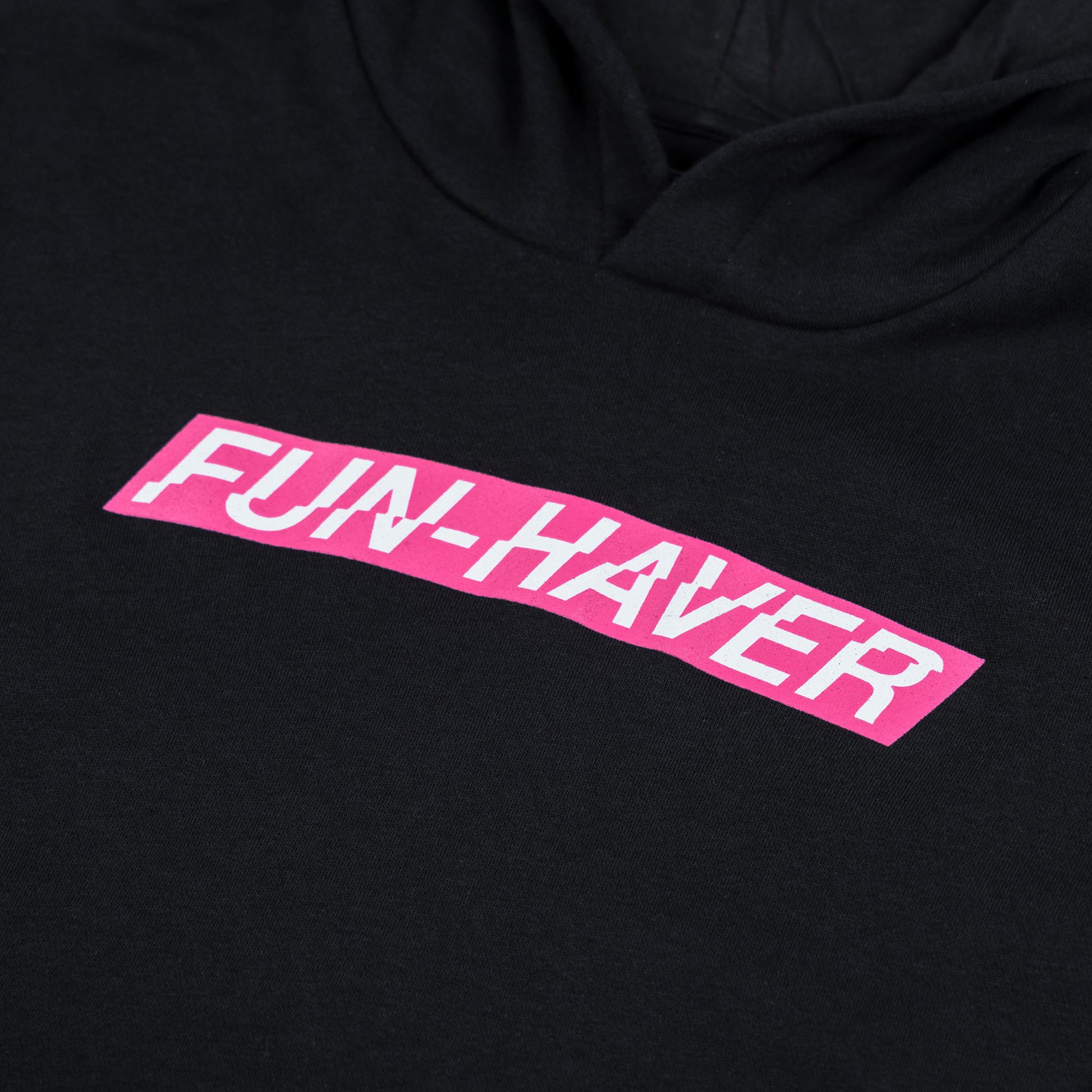 Front detail view of the Pink Energy Logo Fun-Haver Black youth pullover hoodie.