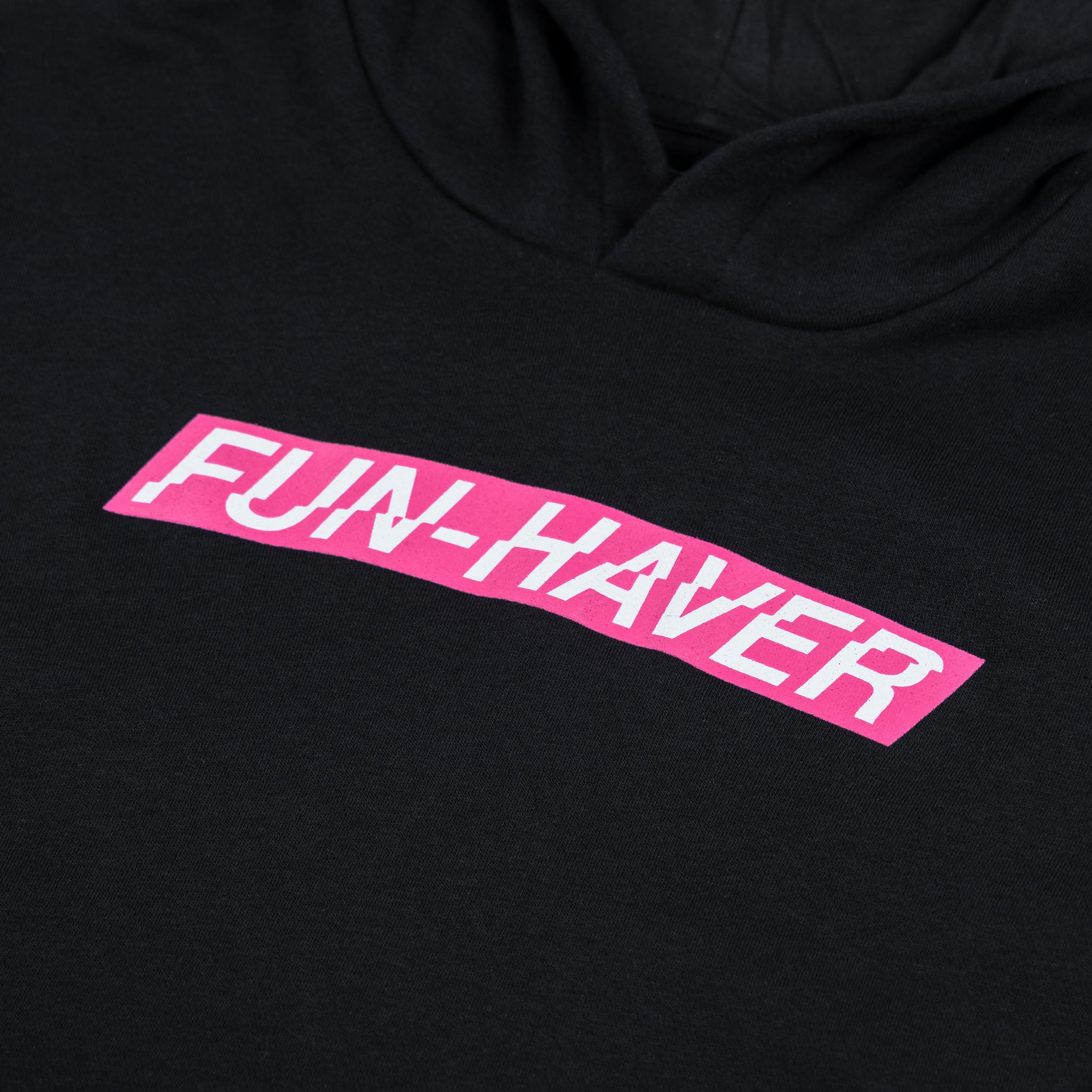 Front detail view of the Pink Energy Logo Fun-Haver Black youth pullover hoodie.