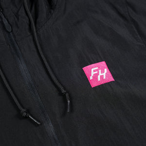 Chest detail view of the Black Fun-Haver Energy Windbreaker Anorak Jacket.