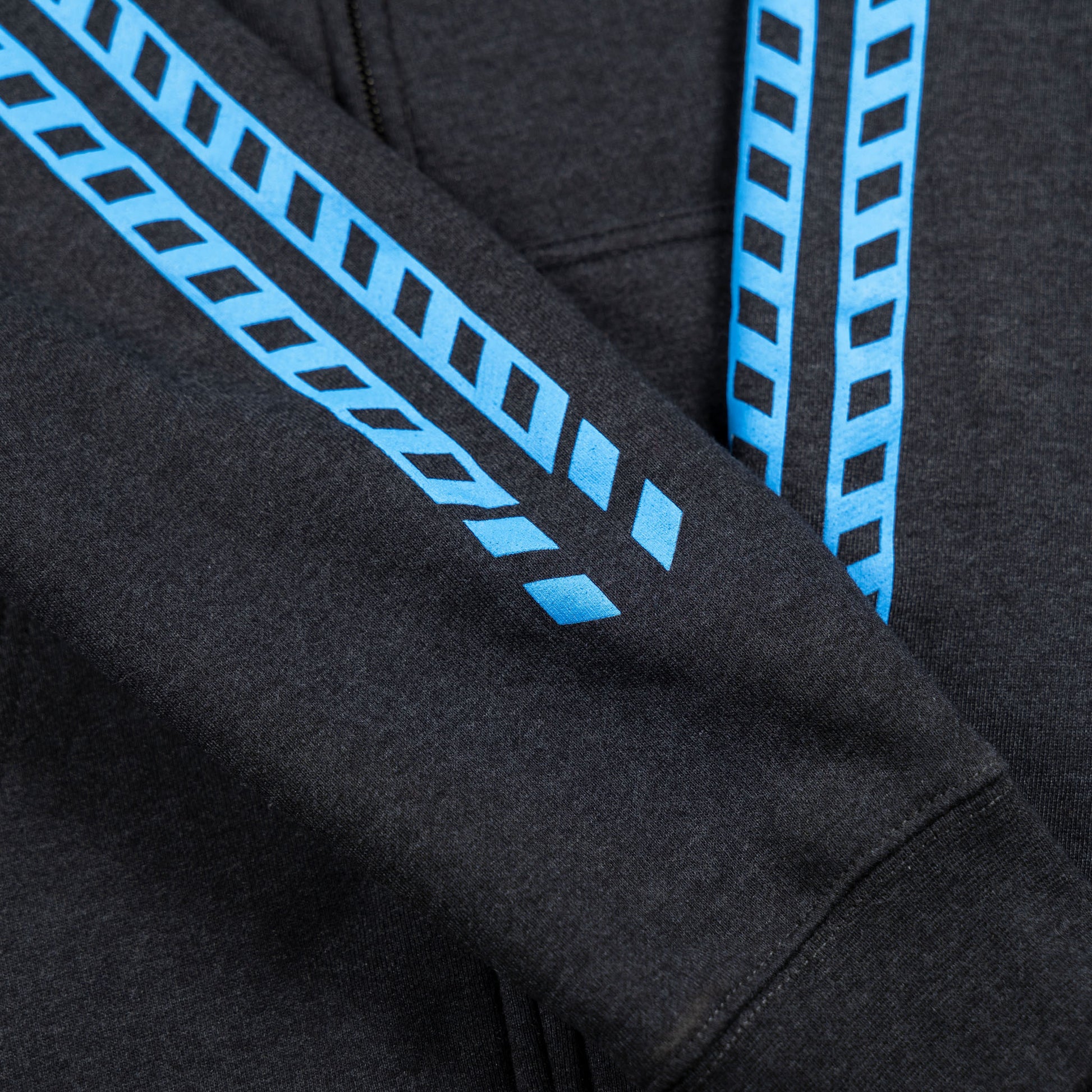 Sleeve detail view of the Fun-Haver Pursuit Zip Hoodie in Charcoal Heather.