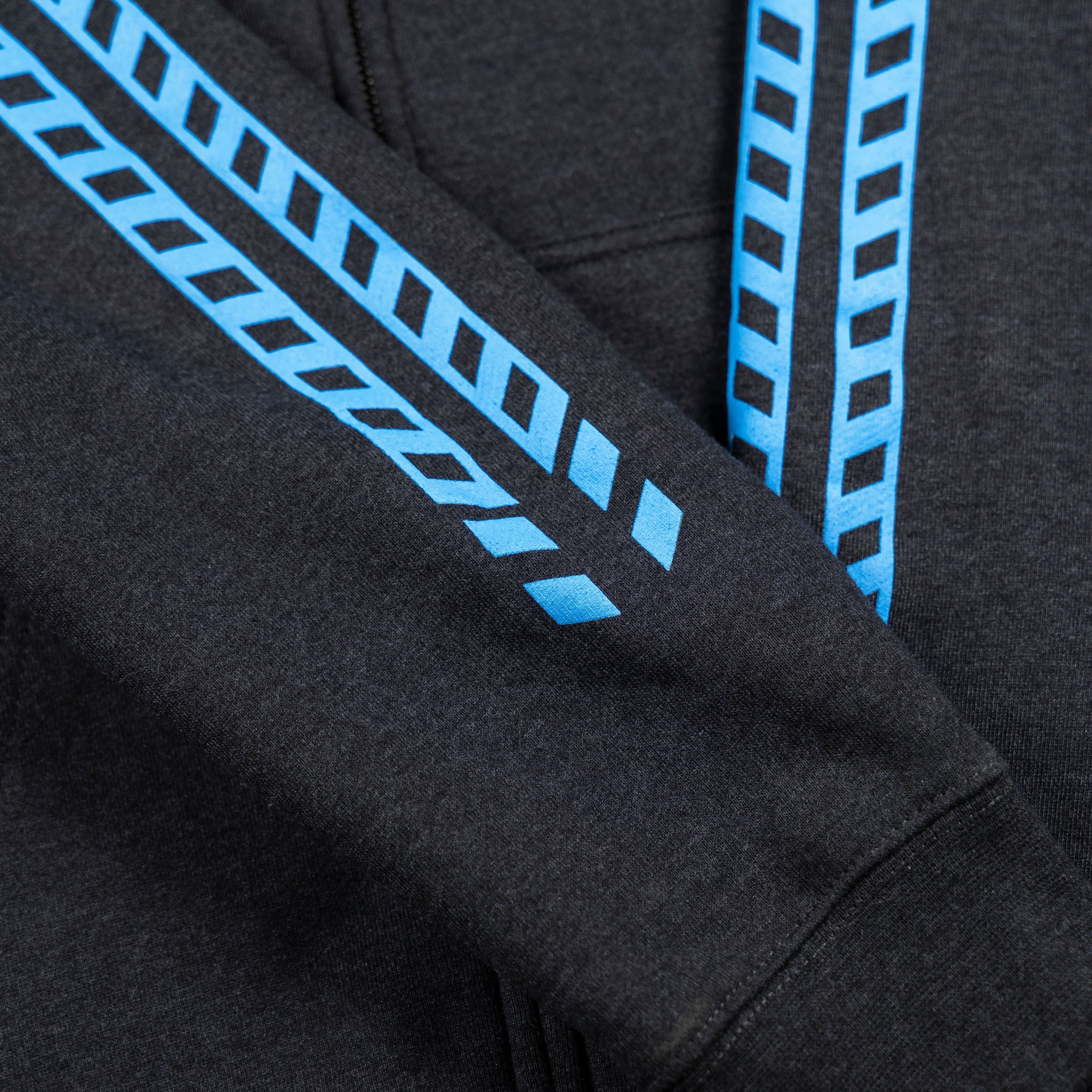 Sleeve detail view of the Fun-Haver Pursuit Zip Hoodie in Charcoal Heather.