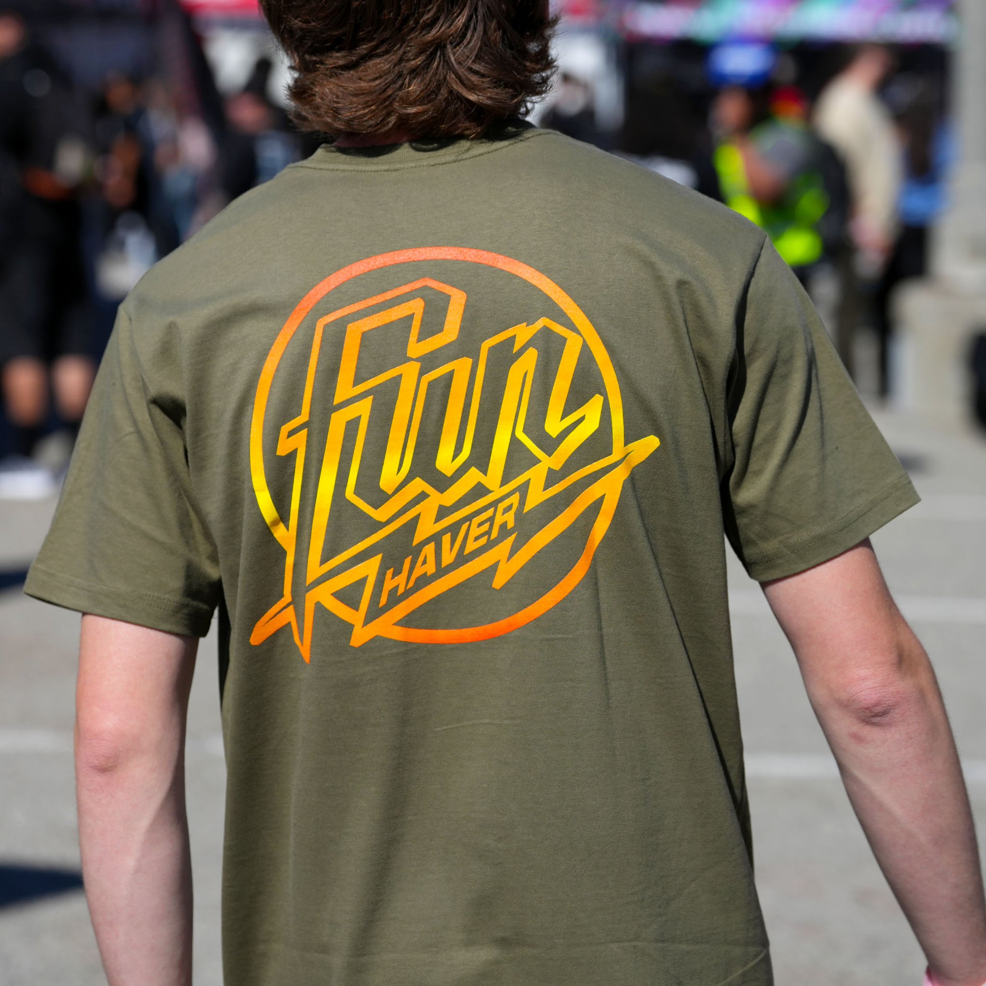 Back view of Rhys Conklin wearing the Fun-Haver Weekend Short Sleeve T-Shirt in Military Green at Formula Drift Long Beach.