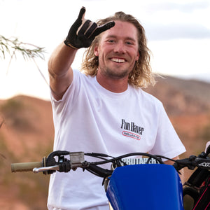 Front view of motocross rider wearing the Fun-Haver No Limits white T-Shirt while sitting on his bike.