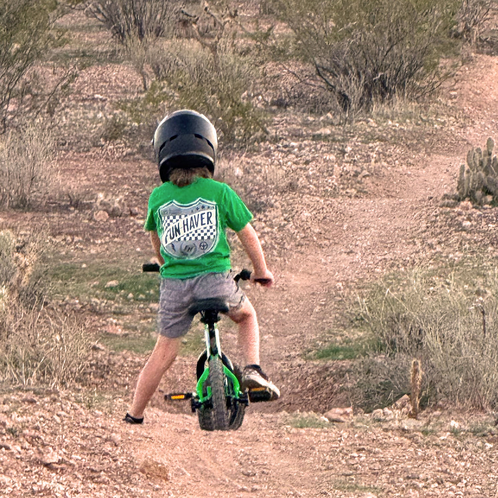 Future Fun-Haver wearing the Fun-Haver® Kelly Green Shield Logo Youth T-Shirt