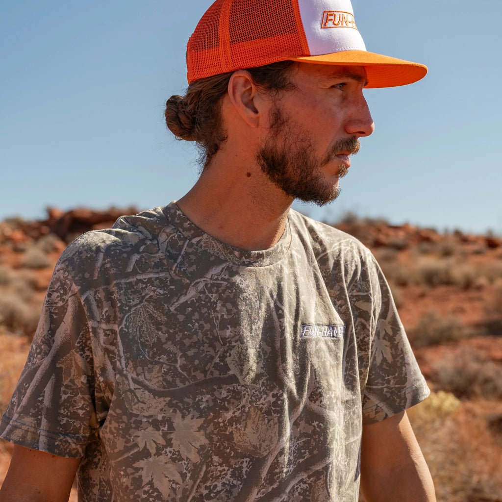 Fun-Haver Short Sleeve Stealth Camo T-Shirt with the Orange and White Decky 5 panel hat worn in the great outdoors.