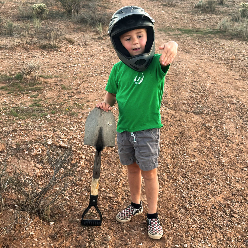 Future Fun-Haver wearing the Fun-Haver® Kelly Green Shield Logo Youth T-Shirt.