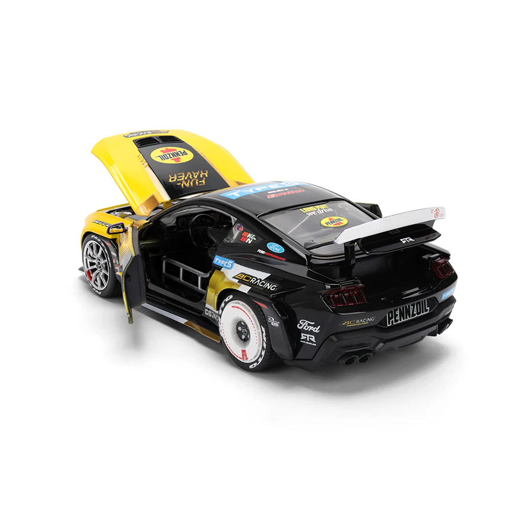Front left movable parts detail view of Chelsea DeNofa's Jada Toys 1:24th Scale Diecast Toy Model 2023 Formula Drift Winning 2023 Ford Mustang RTR Spec 5 competition car.
