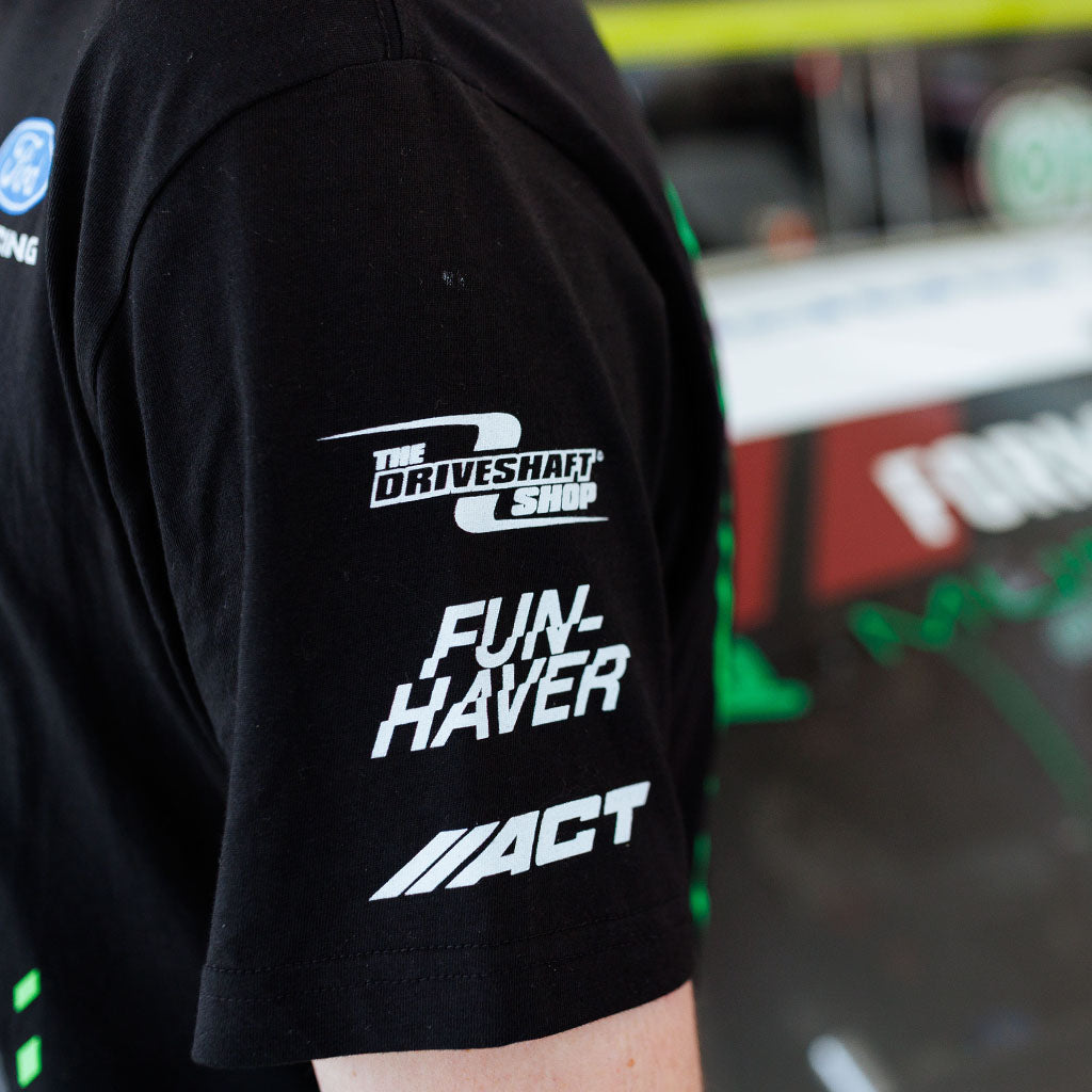 Left sleeve detail view of James Deane wearing his 2026 RTR Drift Team Black T-Shirt.