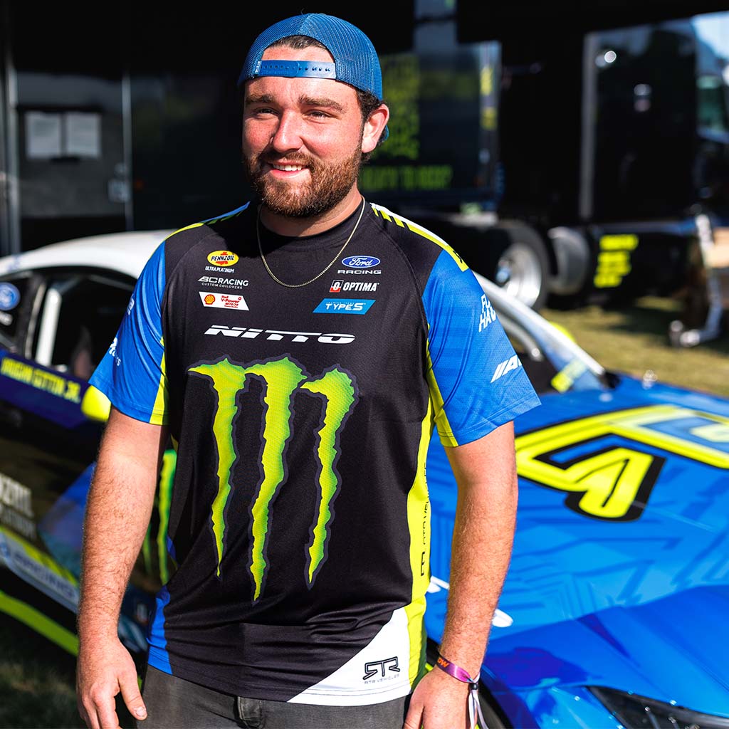 RTR Vehicles team member in the 2026 Vaughn Gittin Jr. Drift Team Sublimated shirt at a Formula Drift event